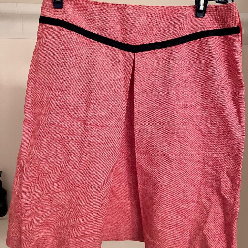 A-line skirt, slightly above the knee